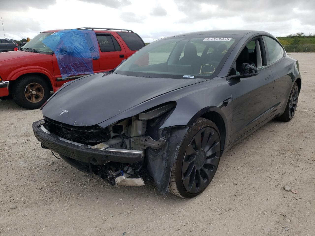 Photo 2 from auction – 2021 TESLA MODEL 3 with VIN 5YJ3E1EC4MF030181