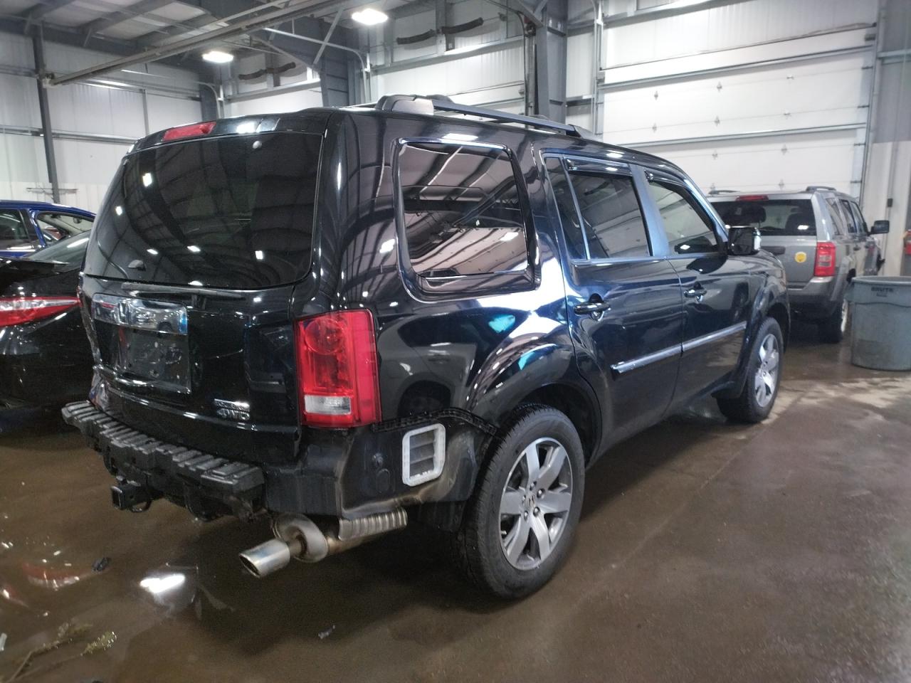 Photo 4 from auction – 2014 HONDA PILOT TOUR with VIN 5FNYF4H98EB006858