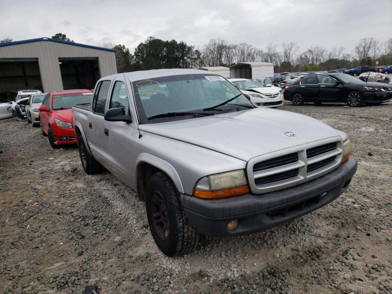 DODGE DAKOTA 2003 with VIN 1D7HL38X13S251735 - Photo from auction