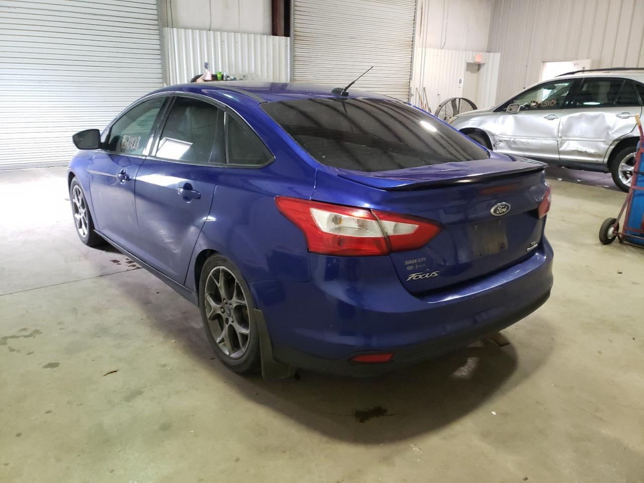Photo 3 from auction – 2014 FORD FOCUS SE with VIN 1FADP3F20EL219124