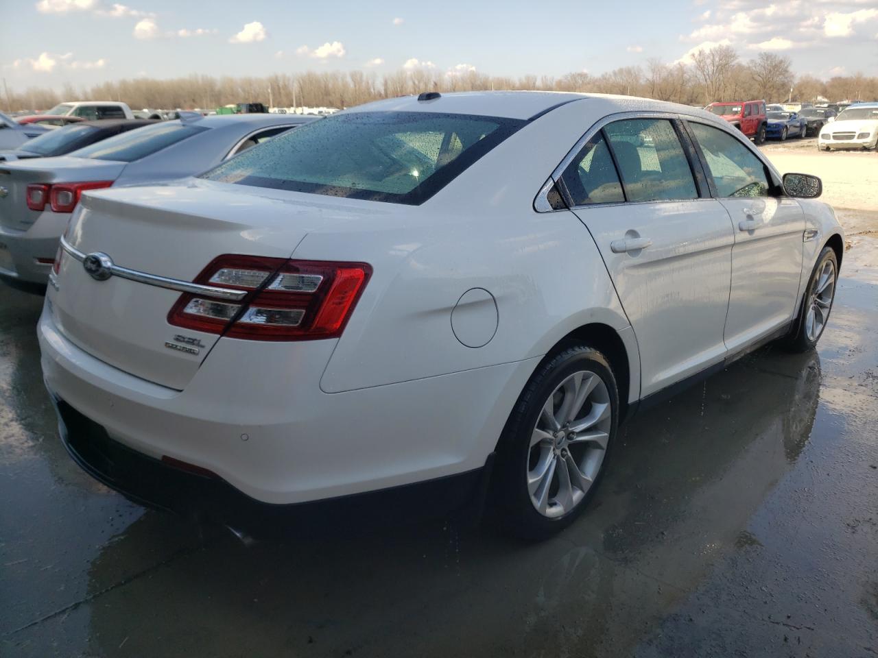 Photo 4 from auction – 2013 FORD TAURUS SEL with VIN 1FAHP2E80DG220525