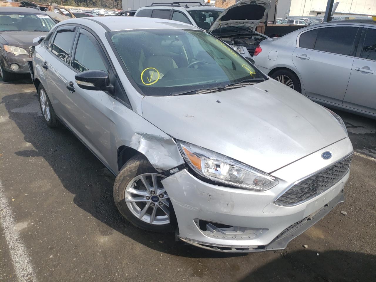 FORD FOCUS SE 2015 with VIN 1FADP3F29FL301564 - Photo from auction