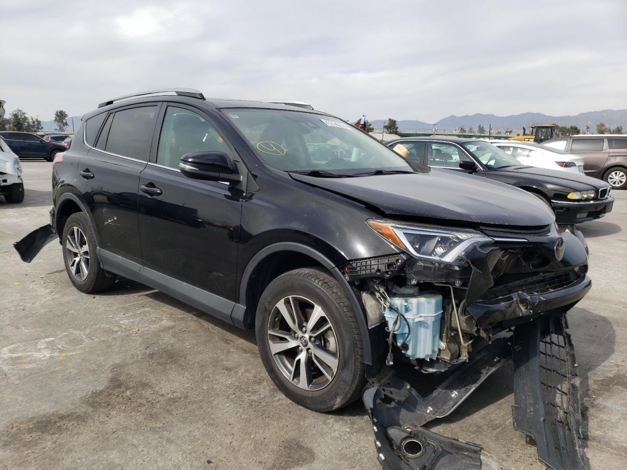 TOYOTA RAV4 XLE 2017 with VIN 2T3RFREV2HW601271 - Photo from auction