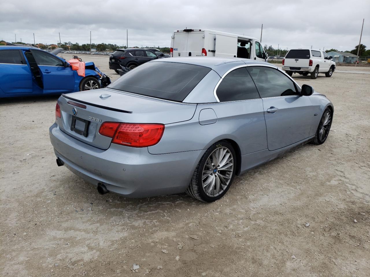 Photo 4 from auction – 2011 BMW 335 I with VIN WBADX7C57BE581402