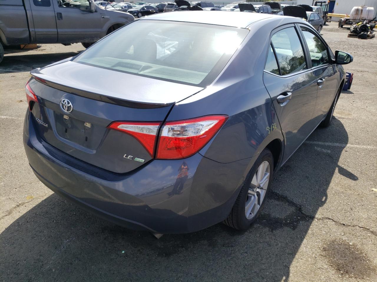 Photo 4 from auction – 2014 TOYOTA COROLLA EC with VIN 5YFBPRHE0EP131158