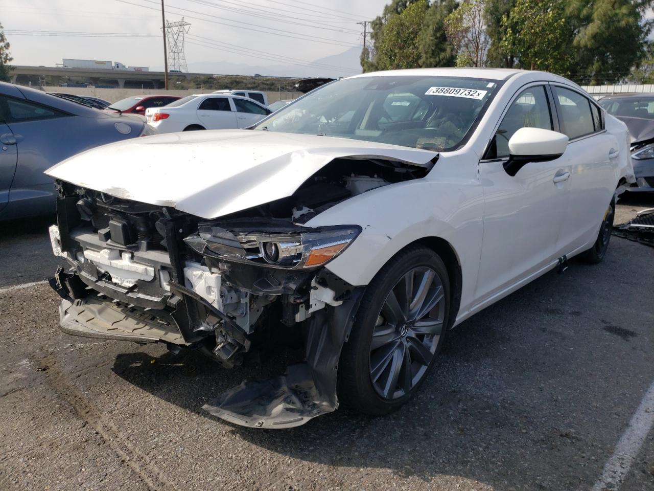 Photo 2 from auction – 2021 MAZDA 6 TOURING with VIN JM1GL1VM4M1608255