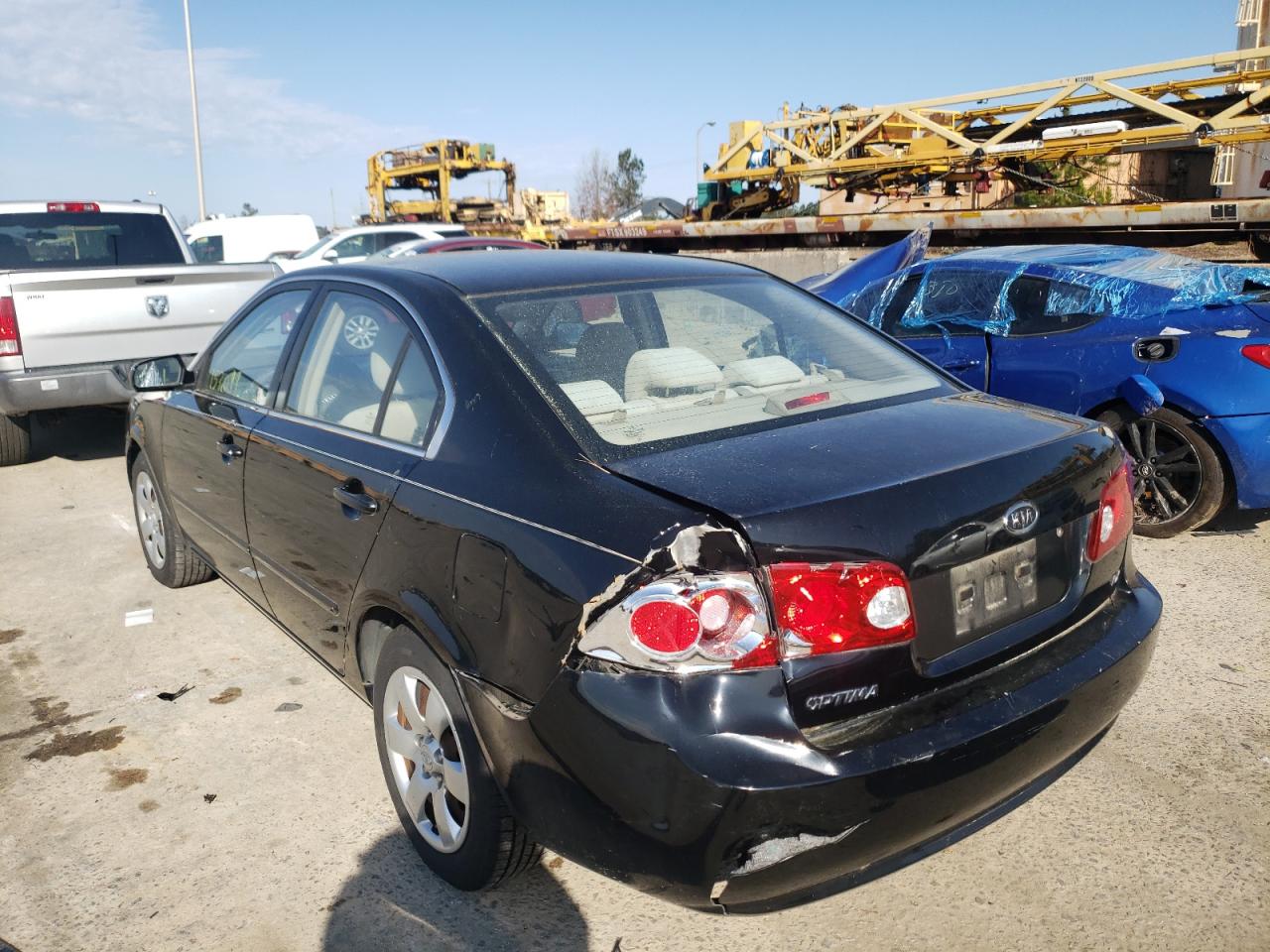 Photo 9 from auction – 2008 KIA OPTIMA LX with VIN KNAGE123985220908
