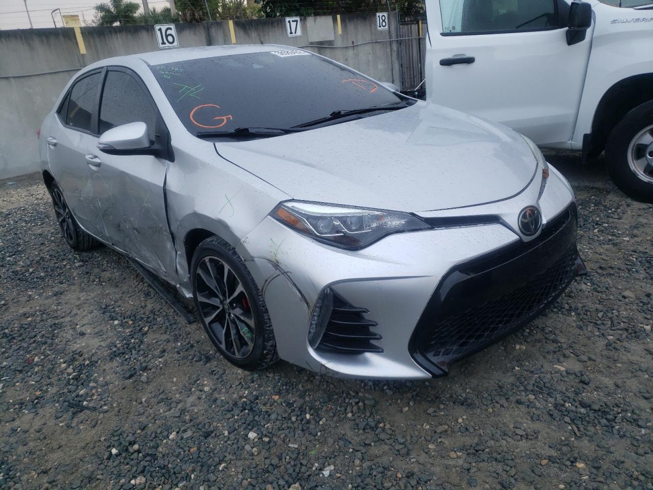 TOYOTA COROLLA L 2018 with VIN 2T1BURHE8JC064960 - Photo from auction