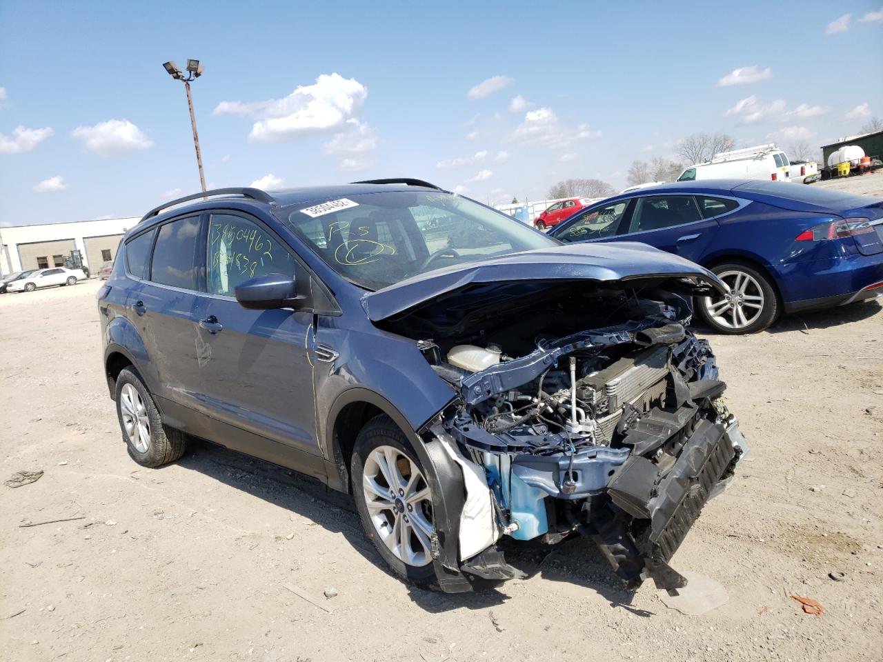 Photo 1 from auction – 2018 FORD ESCAPE SE with VIN 1FMCU9GD8JUB74838