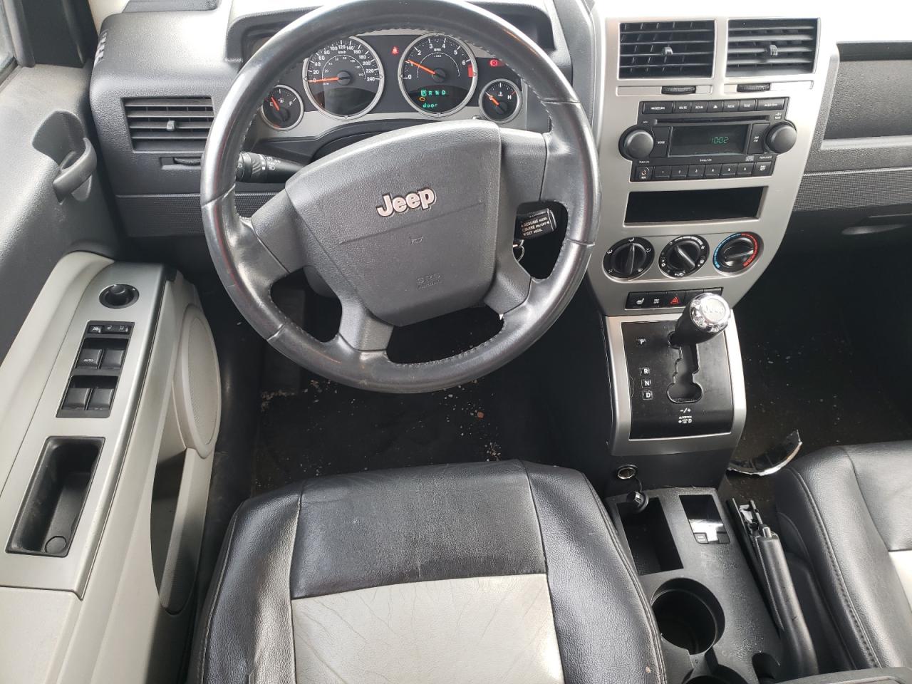Photo 9 from auction – 2007 JEEP COMPASS LI with VIN 1J8FF57WX7D264659