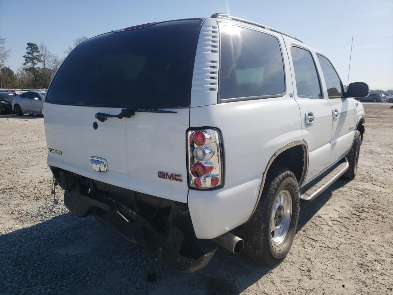 Photo 4 from auction – 2003 GMC YUKON with VIN 1GKEC13Z03R259380