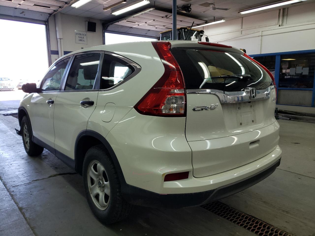 Photo 3 from auction – 2016 HONDA CR-V LX with VIN 5J6RM4H36GL009161