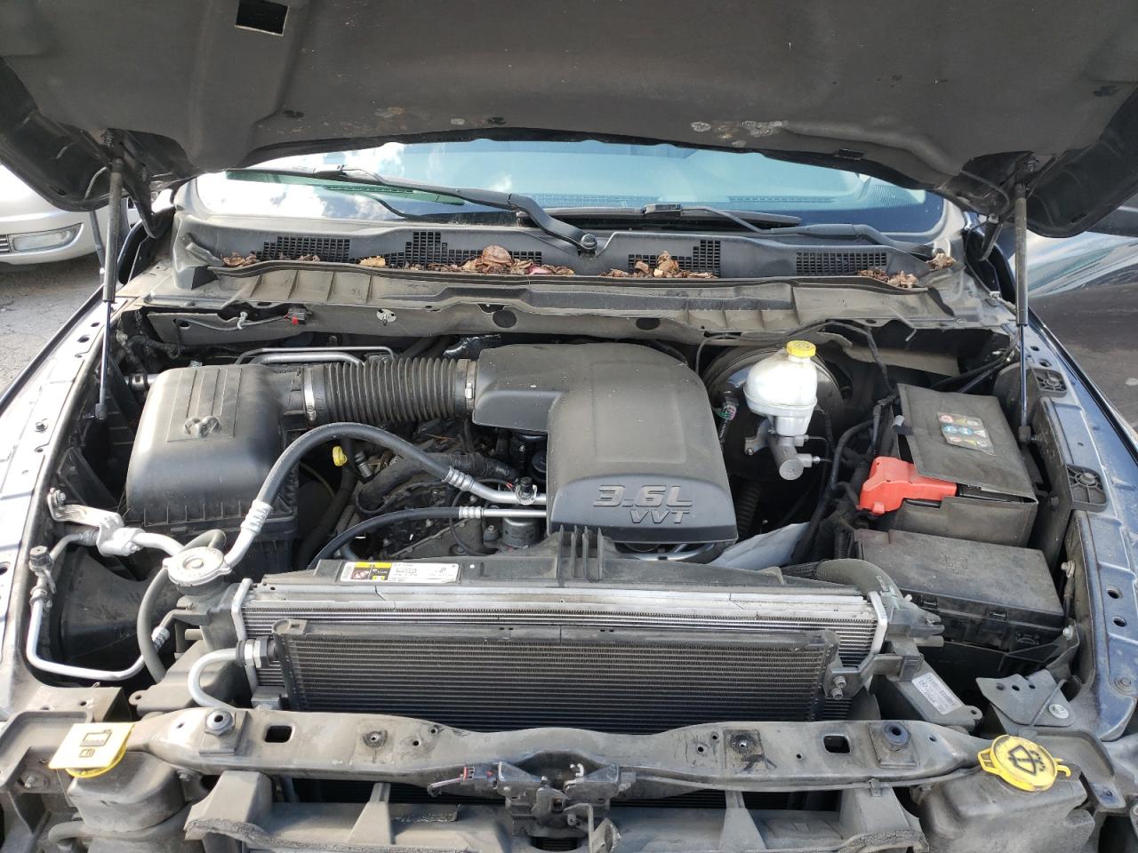 Photo 7 from auction – 2013 RAM 1500 SLT with VIN 1C6RR6LG9DS571366