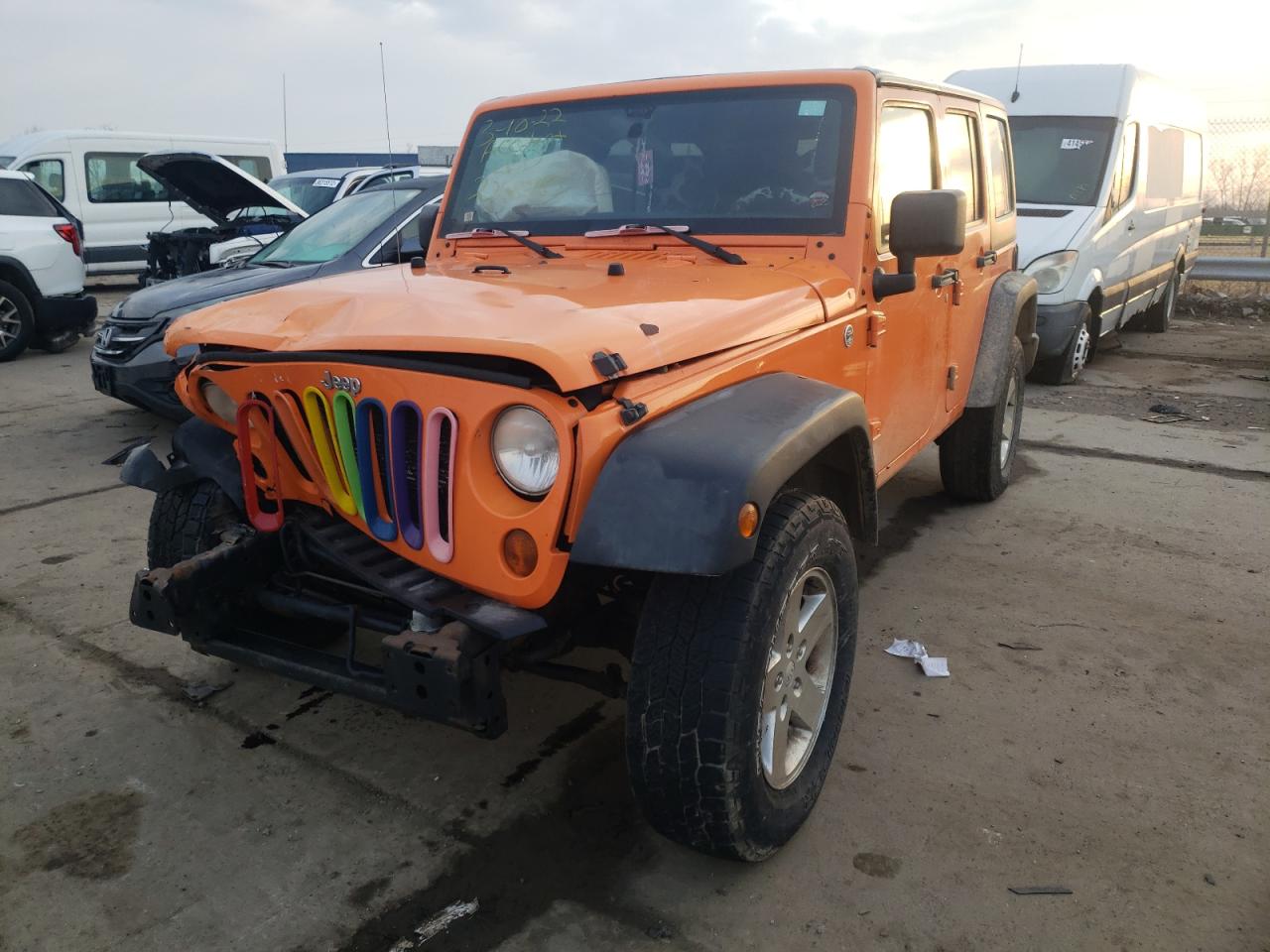 Photo 2 from auction – 2012 JEEP WRANGLER U with VIN 1C4BJWDG2CL166779