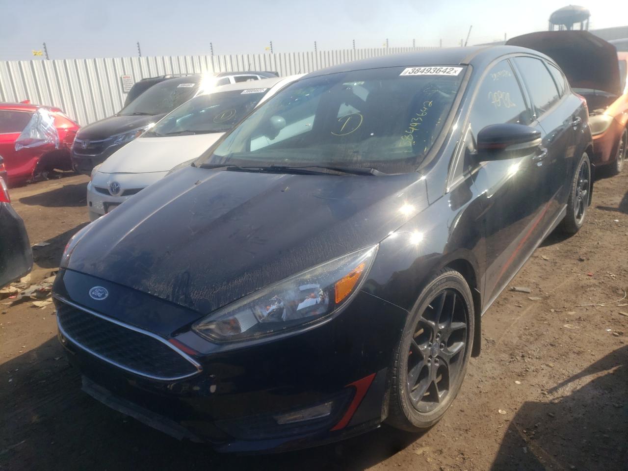 Photo 2 from auction – 2016 FORD FOCUS SE with VIN 1FADP3K21GL299557