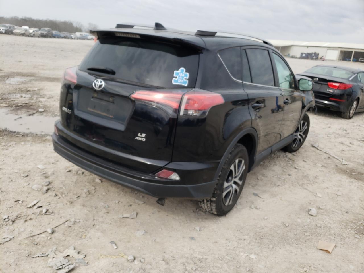 Photo 4 from auction – 2016 TOYOTA RAV4 LE with VIN 2T3BFREV6GW414423