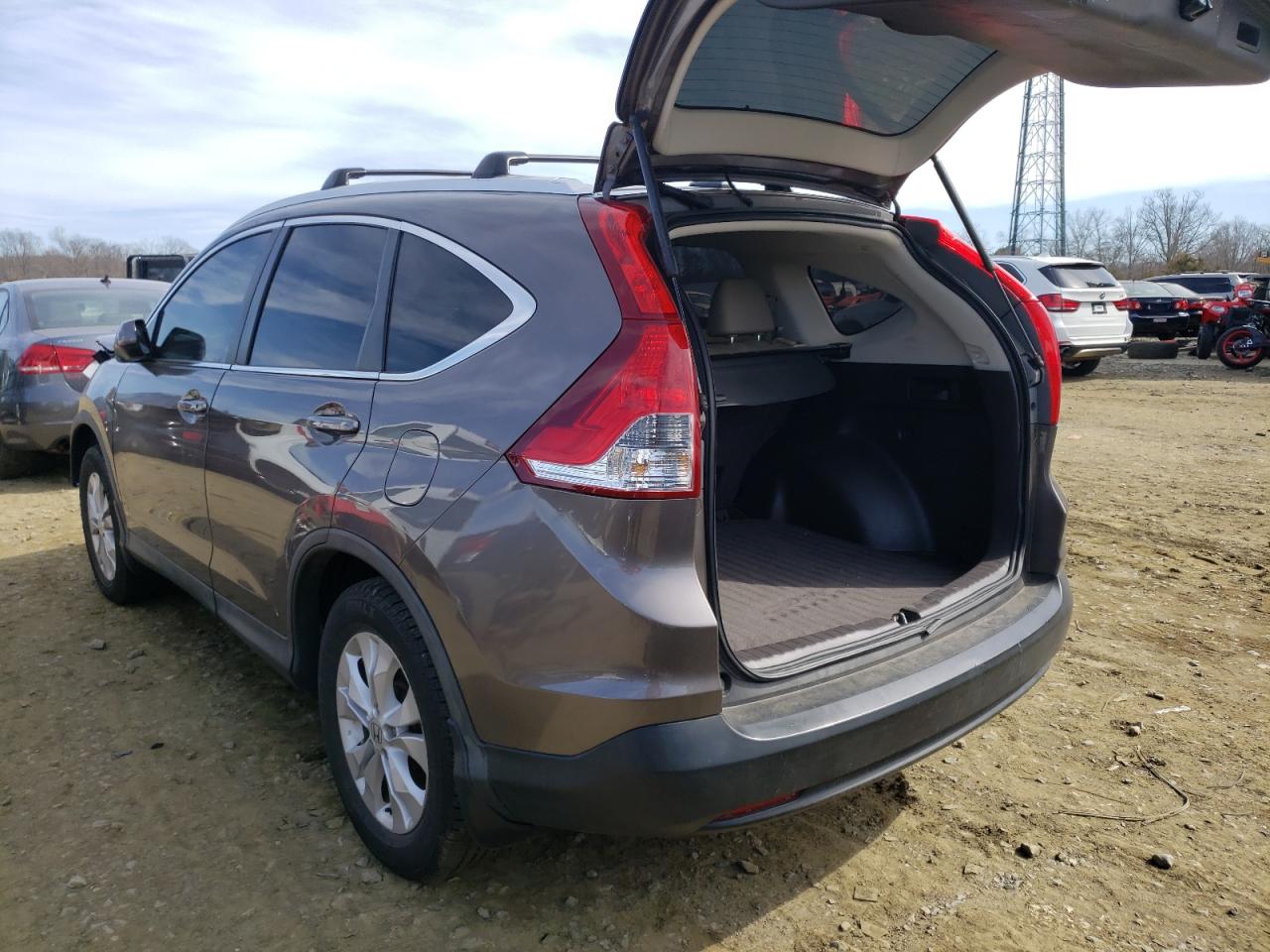 Photo 3 from auction – 2014 HONDA CR-V EXL with VIN 2HKRM4H74EH675445