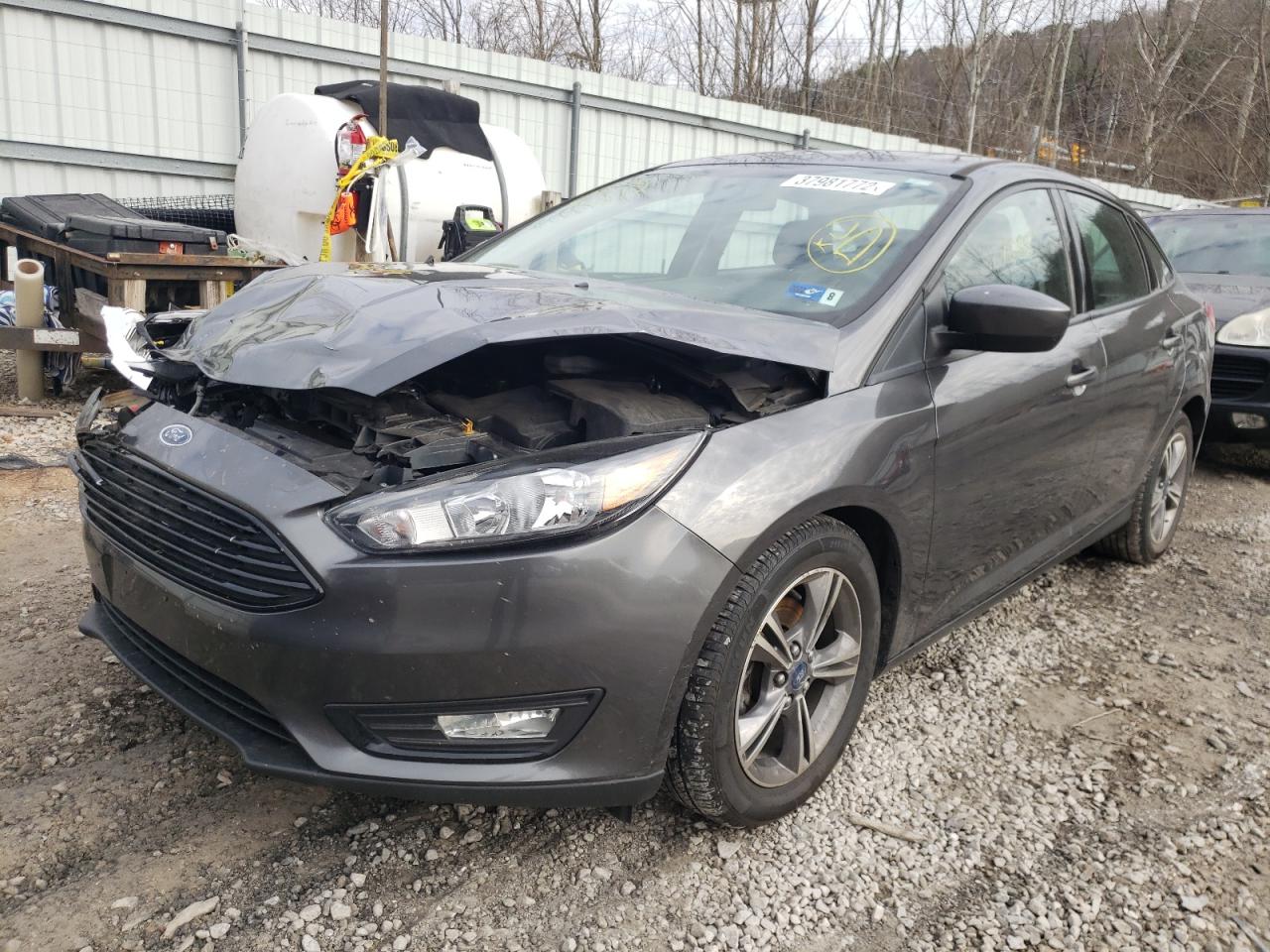 Photo 2 from auction – 2018 FORD FOCUS SE with VIN 1FADP3FEXJL235030