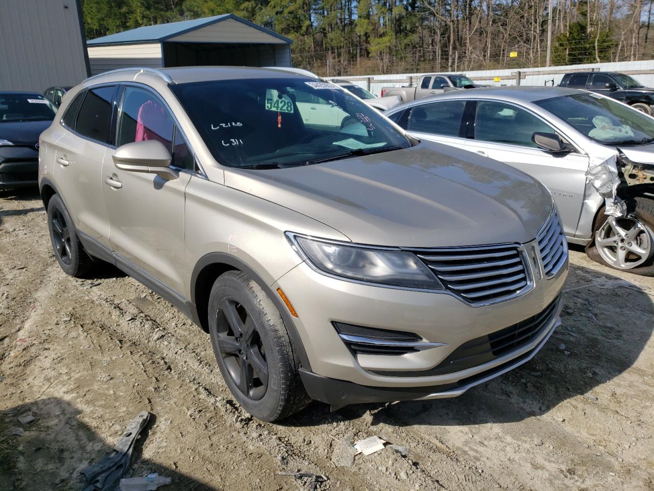 LINCOLN MKC 2015 with VIN 5LMCJ1A91FUJ27881 - Photo from auction