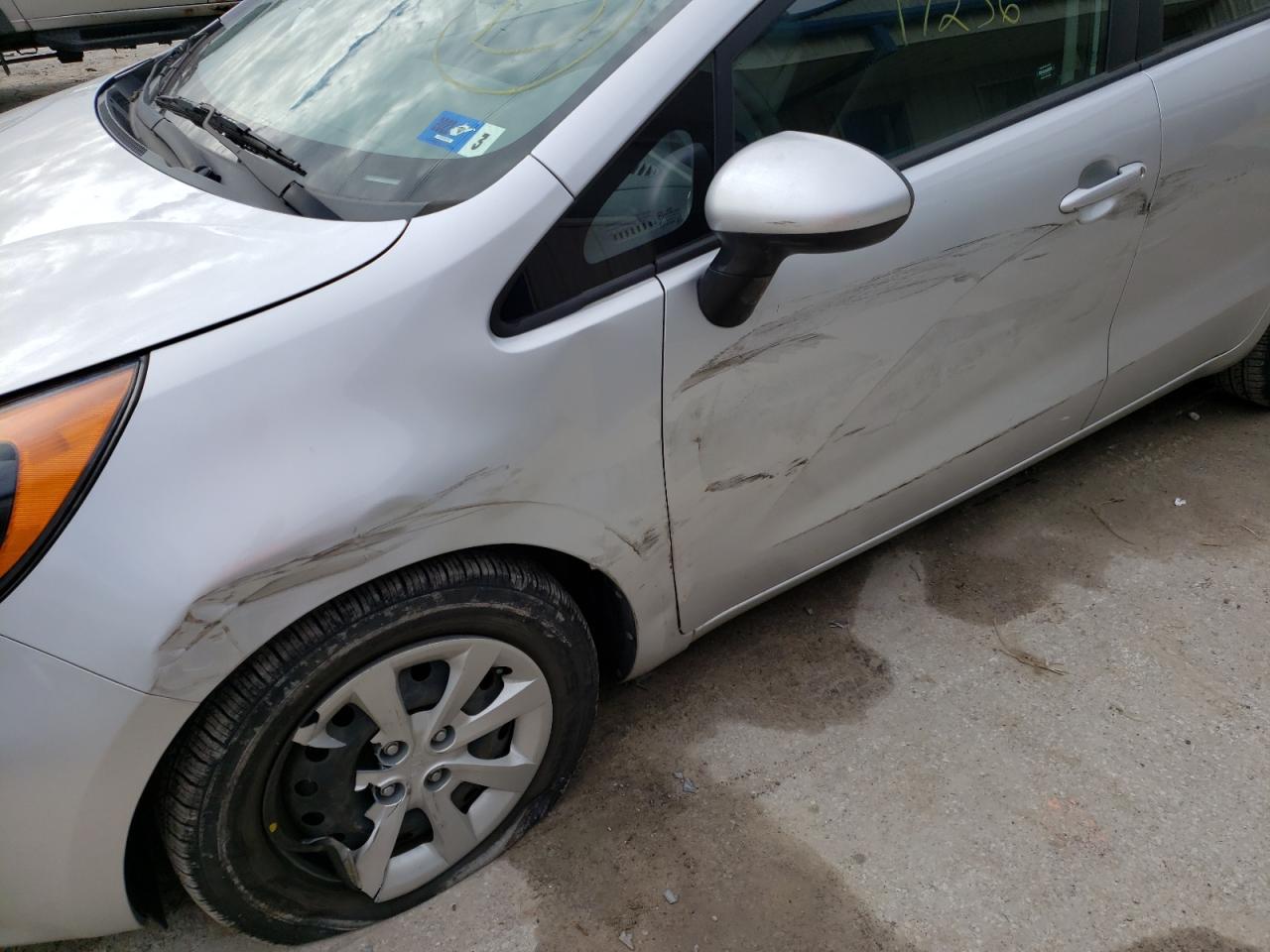 Photo 9 from auction – 2015 KIA RIO LX with VIN KNADM5A39F6518106