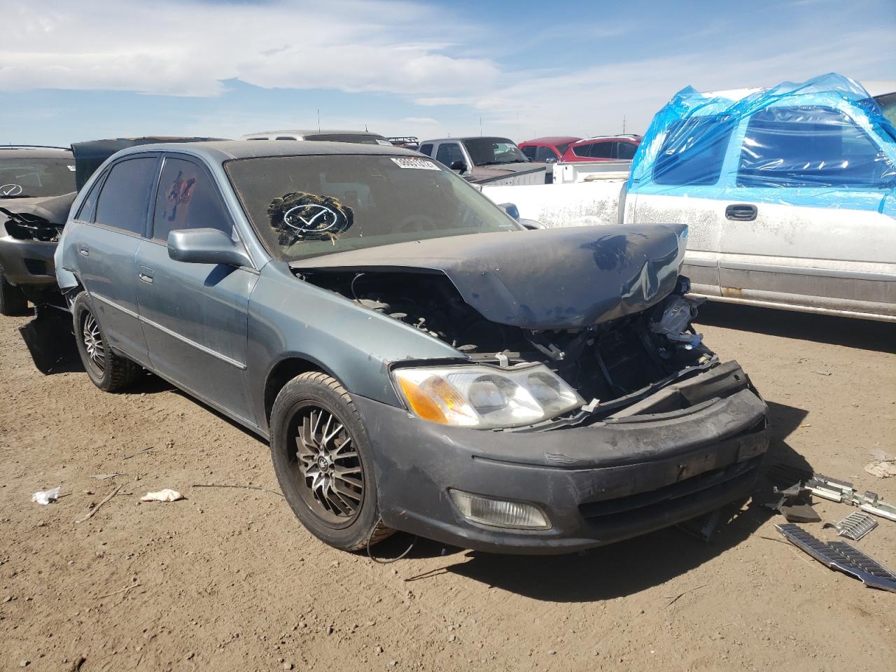 TOYOTA AVALON XL 2000 with VIN 4T1BF28B6YU047221 - Photo from auction