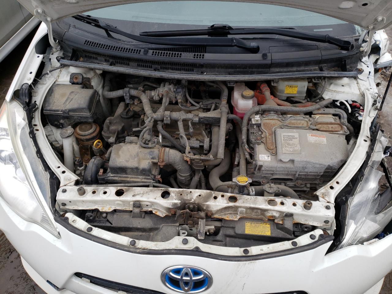 Photo 7 from auction – 2014 TOYOTA PRIUS C with VIN JTDKDTB38E1565166