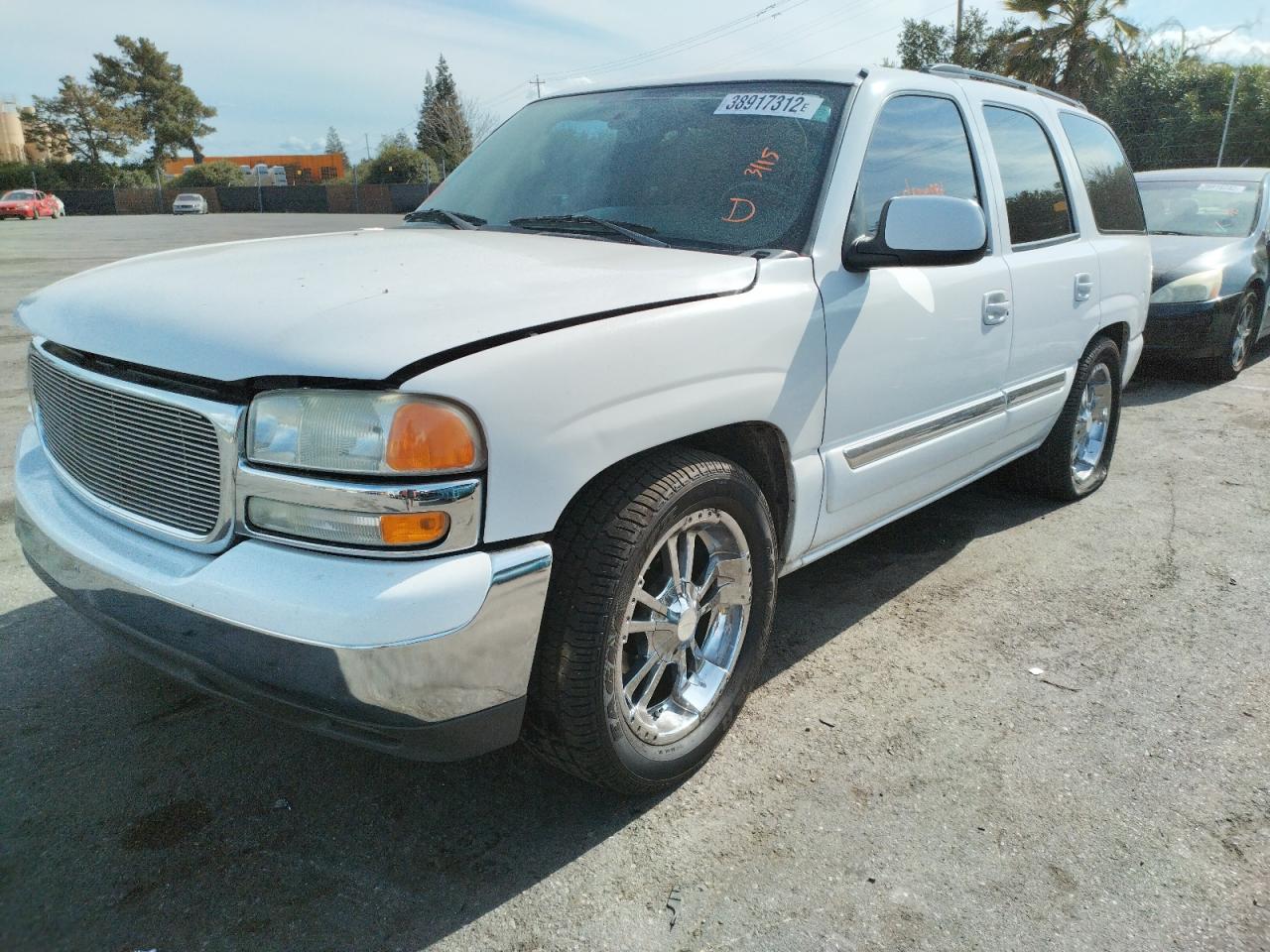Photo 2 from auction – 2004 GMC YUKON with VIN 1GKEC13V84R244821
