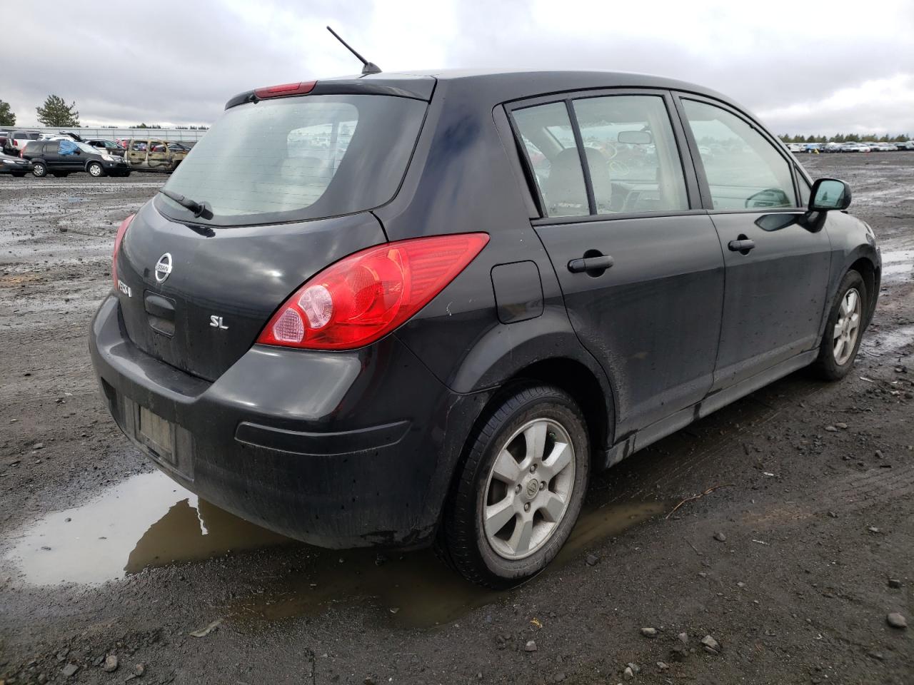 Photo 4 from auction – 2009 NISSAN VERSA S with VIN 3N1BC13E49L387040