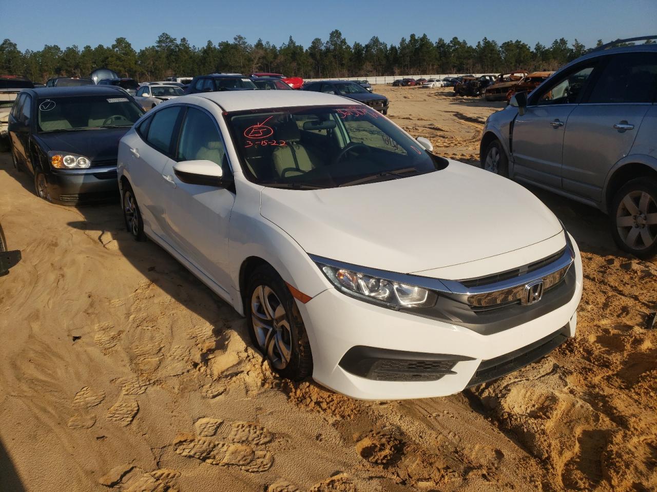 HONDA CIVIC LX 2017 with VIN 19XFC2F52HE040860 - Photo from auction