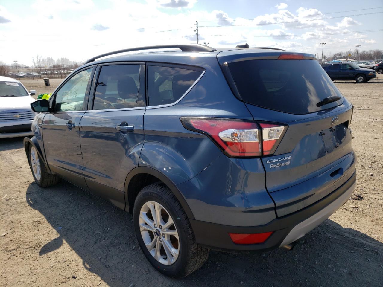 Photo 3 from auction – 2018 FORD ESCAPE SE with VIN 1FMCU9GD8JUB74838