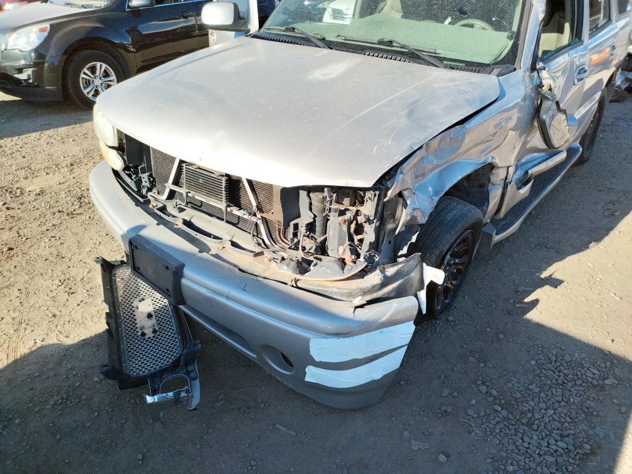 Photo 10 from auction – 2004 GMC YUKON with VIN 1GKEK63U94J326157
