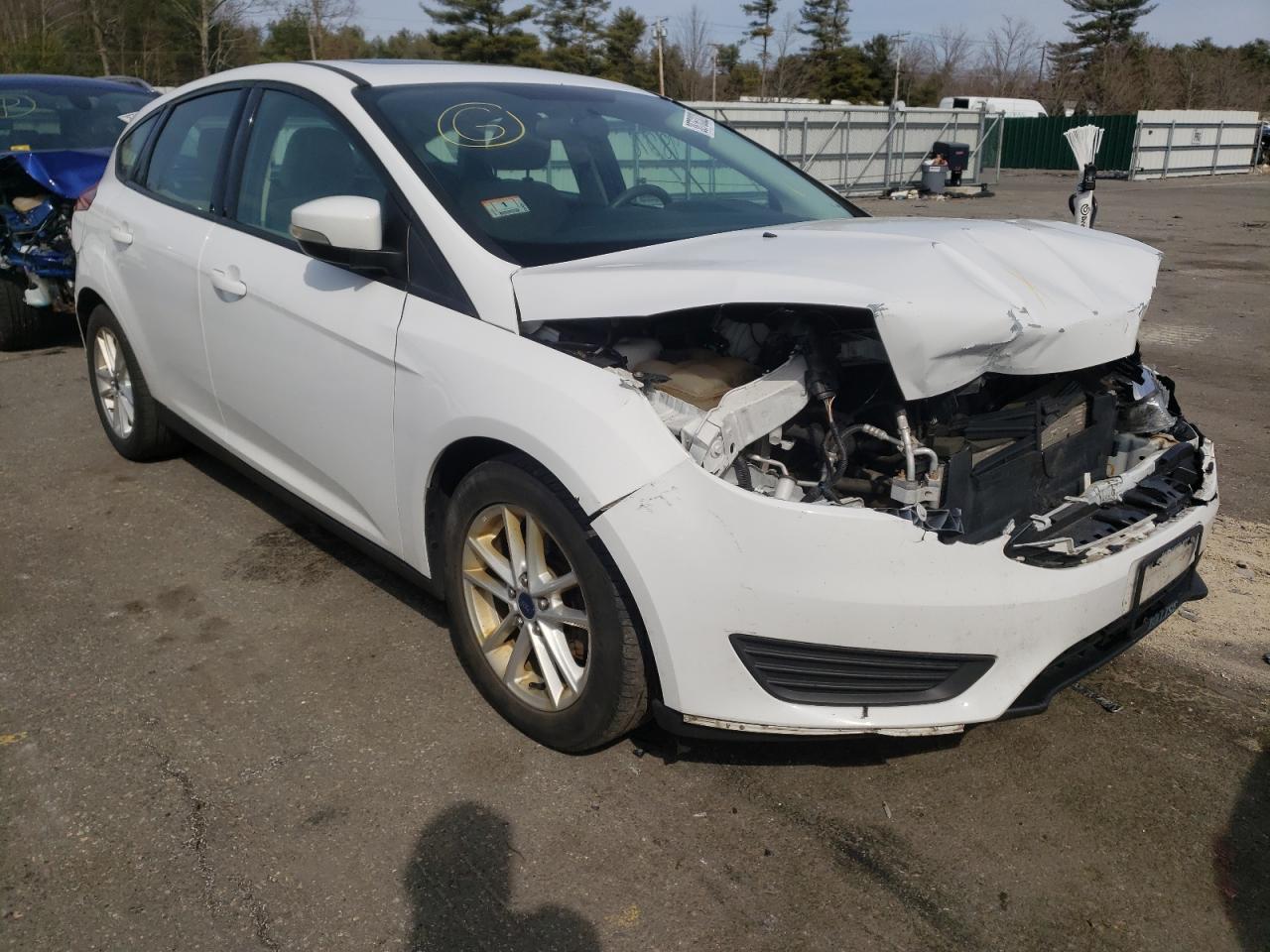 FORD FOCUS SE 2015 with VIN 1FADP3K27FL328932 - Photo from auction