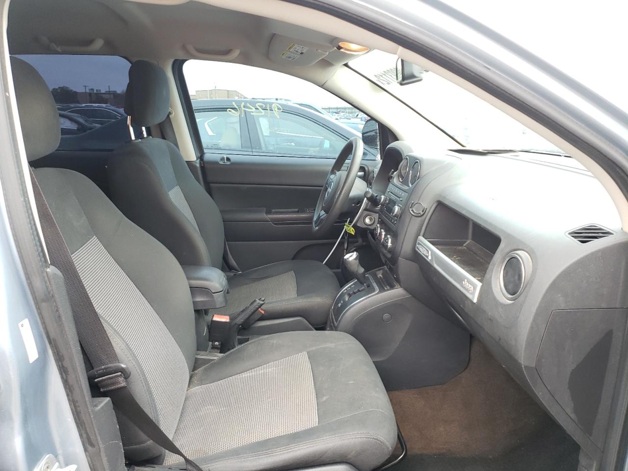 Foto 5 de la subasta – 2014 JEEP COMPASS SP con VIN 1C4NJCBA1ED504163