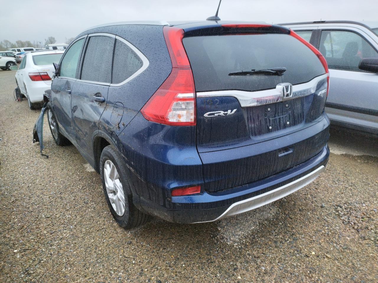 Photo 3 from auction – 2016 HONDA CR-V EXL with VIN 2HKRM4H79GH705364