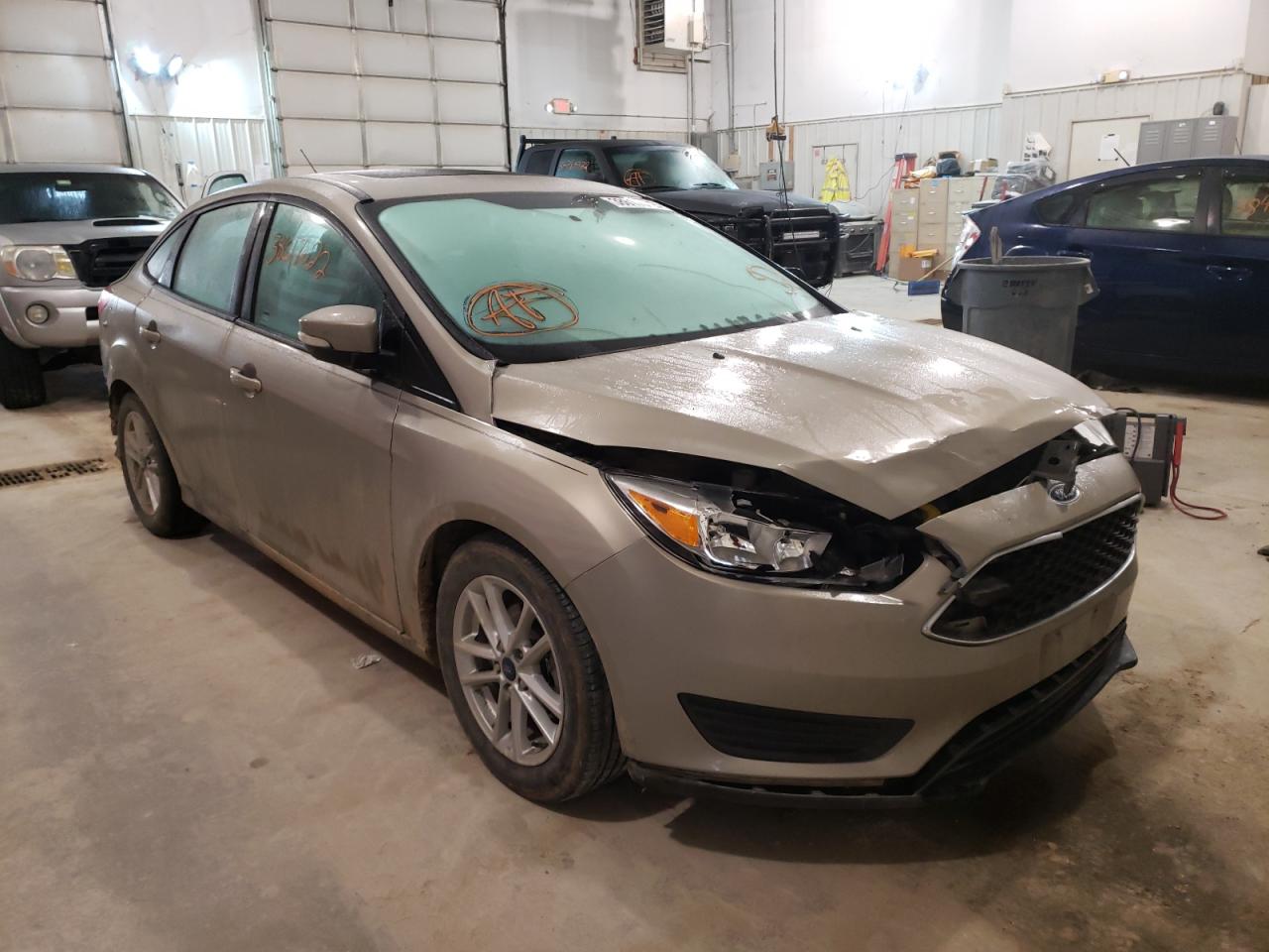 FORD FOCUS SE 2016 with VIN 1FADP3F22GL345293 - Photo from auction