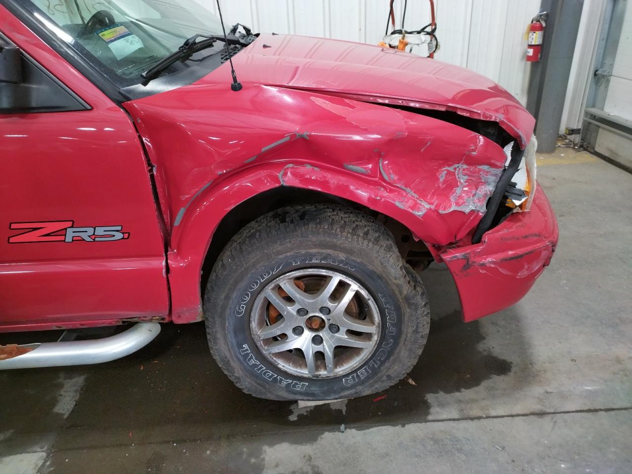 Photo 9 from auction – 2003 GMC SONOMA with VIN 1GTDT13X43K179658