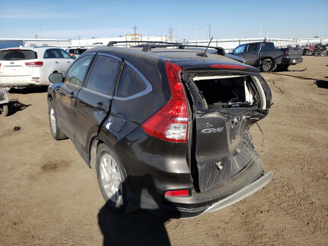 Photo 3 from auction – 2015 HONDA CR-V EXL with VIN 2HKRM4H71FH667675