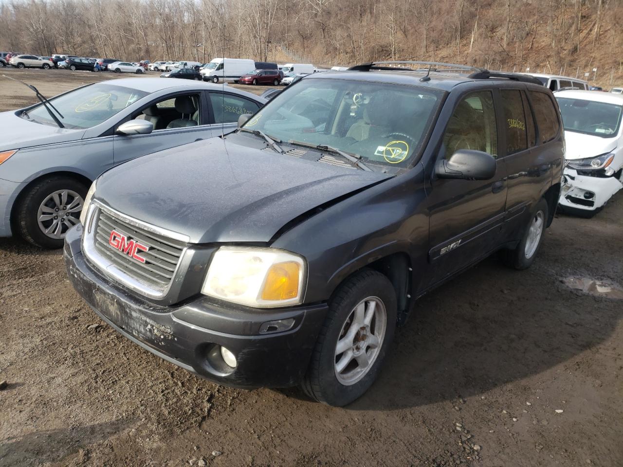 Photo 2 from auction – 2004 GMC ENVOY with VIN 1GKDT13S142434910
