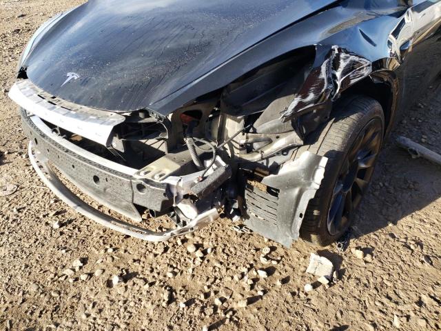 Photo 9 from auction – 2021 TESLA MODEL Y with VIN 5YJYGDEE2MF210150