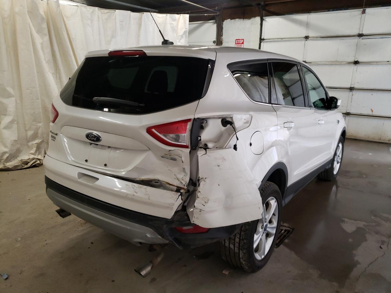 Photo 4 from auction – 2015 FORD ESCAPE SE with VIN 1FMCU9GX0FUC53163