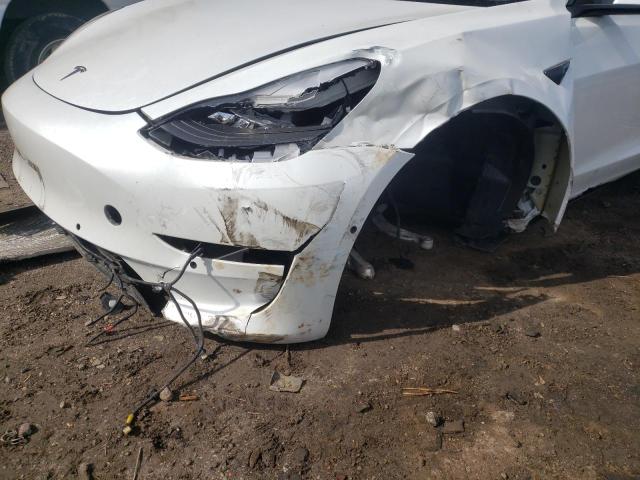 Photo 9 from auction – 2018 TESLA MODEL 3 with VIN 5YJ3E1EB4JF185882