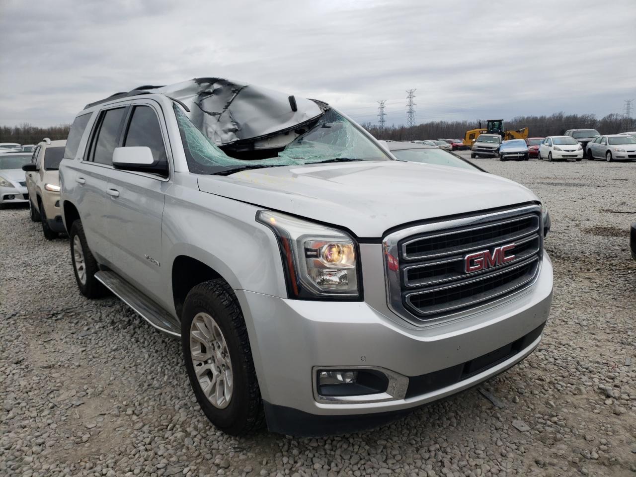 GMC YUKON SLE 2015 with VIN 1GKS1AKC2FR118076 - Photo from auction