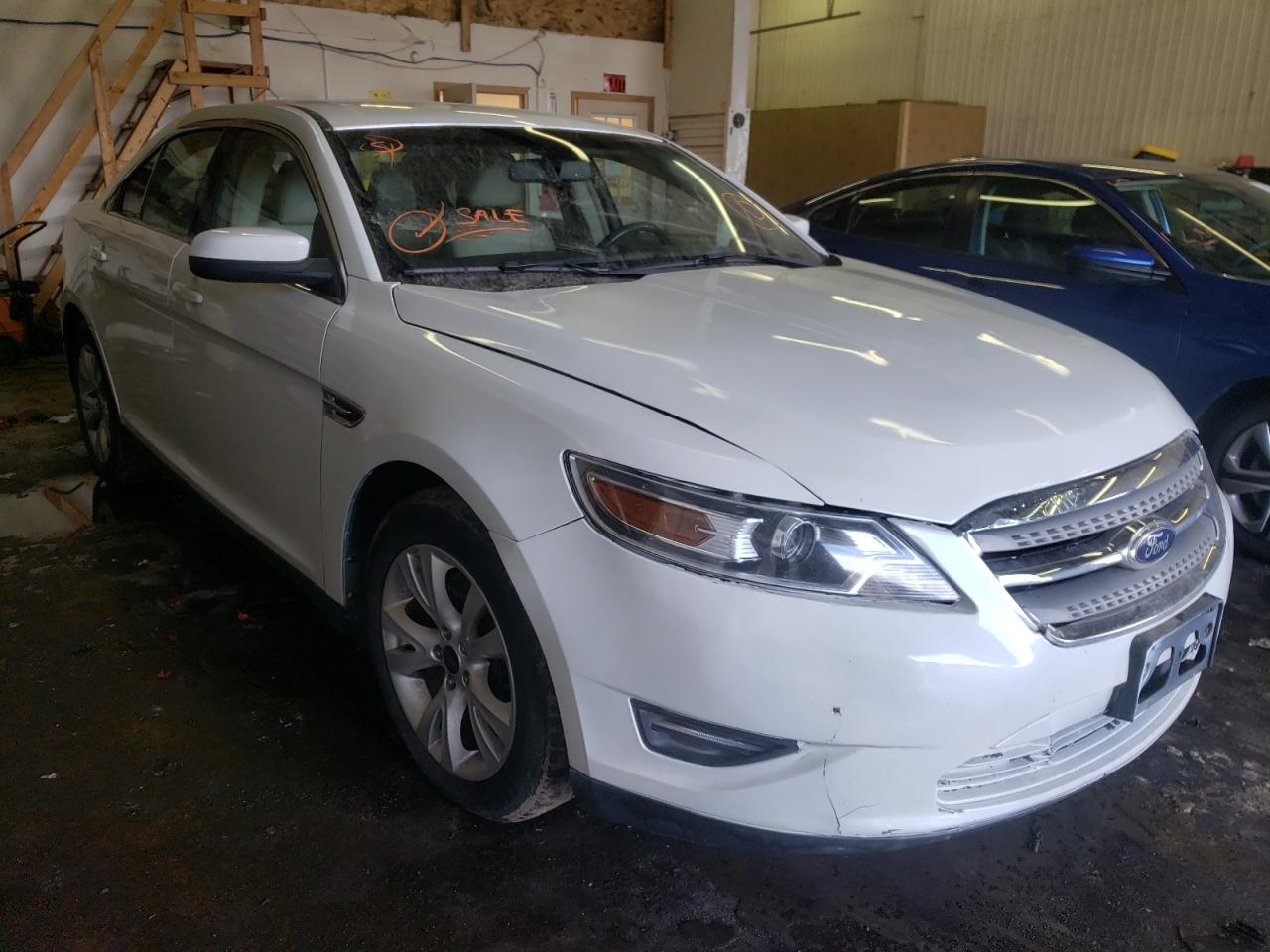 FORD TAURUS SEL 2011 with VIN 1FAHP2EW7BG143728 - Photo from auction