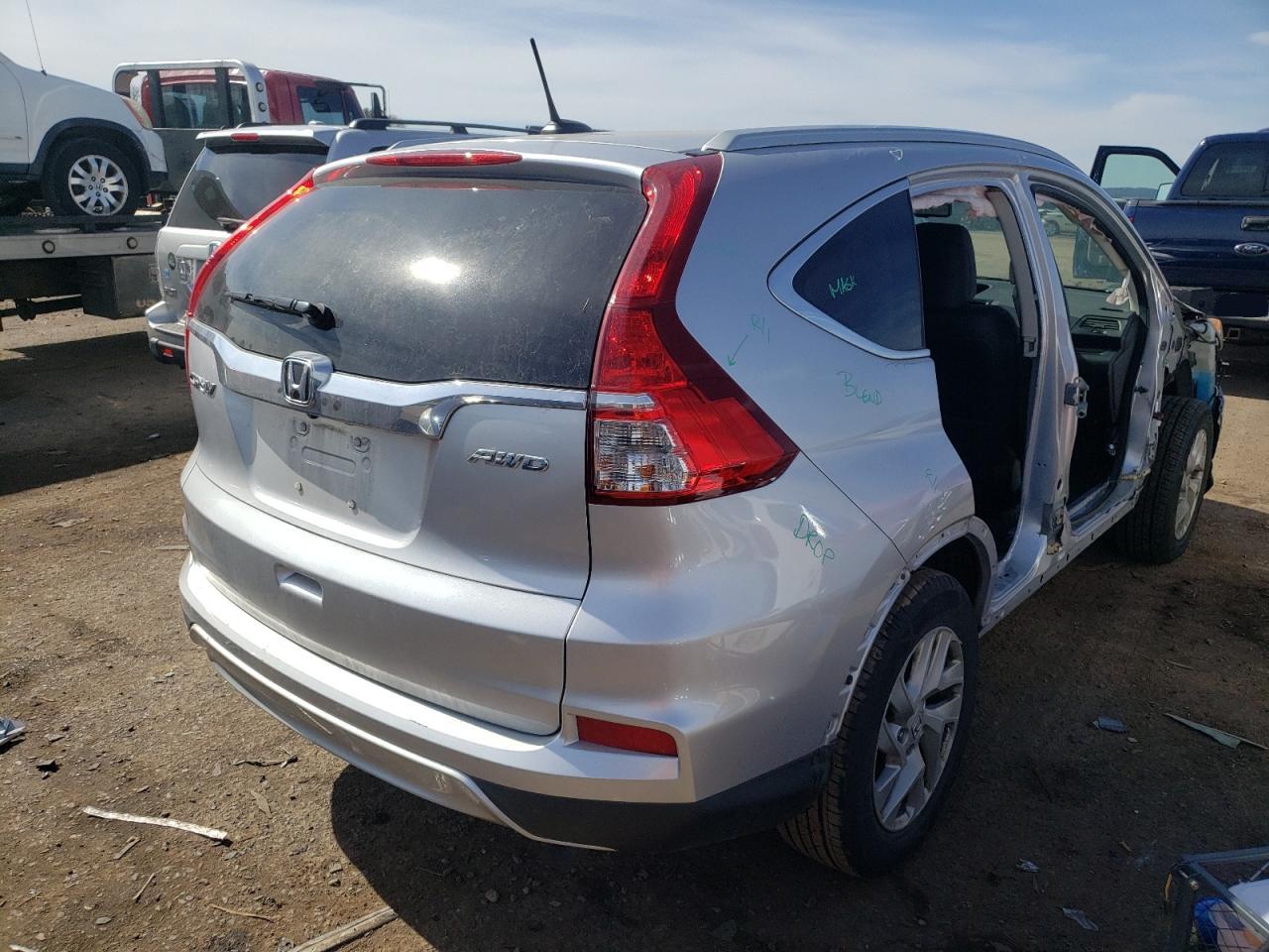 Photo 4 from auction – 2016 HONDA CR-V EXL with VIN 2HKRM4H75GH663193