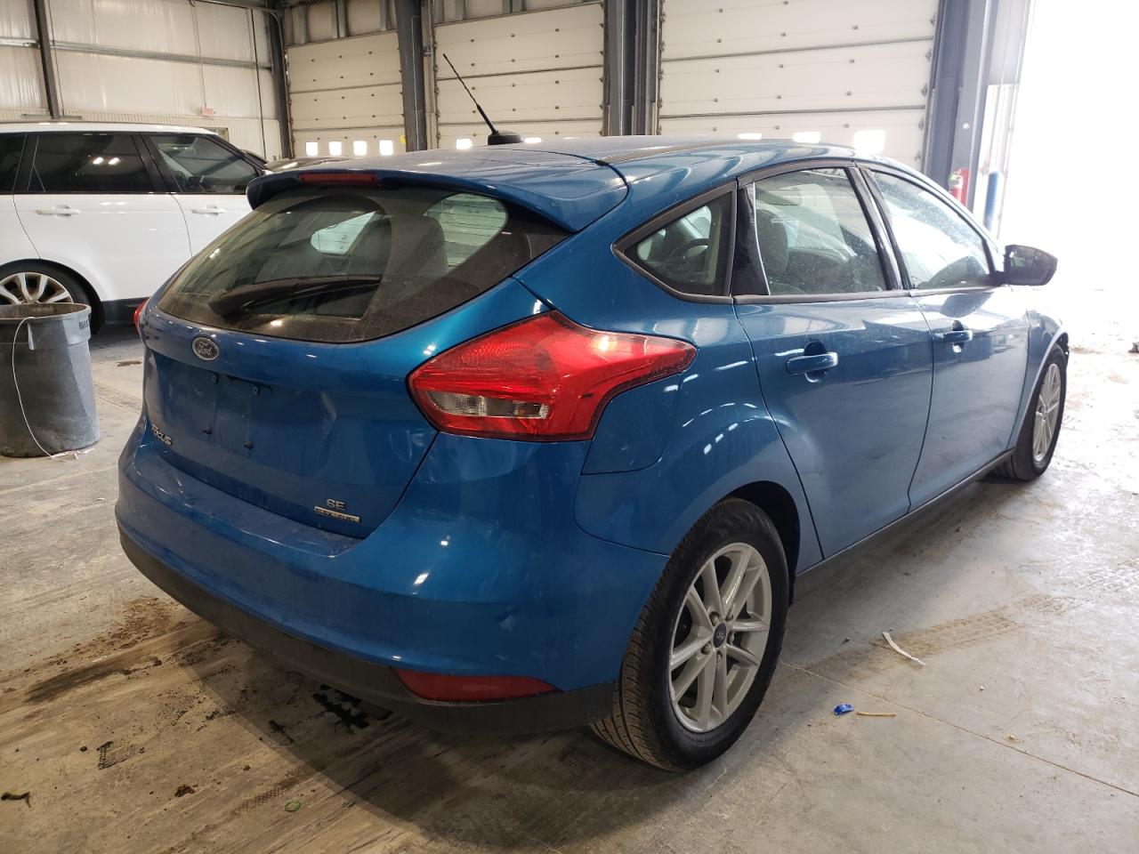 Photo 4 from auction – 2015 FORD FOCUS SE with VIN 1FADP3K23FL220842