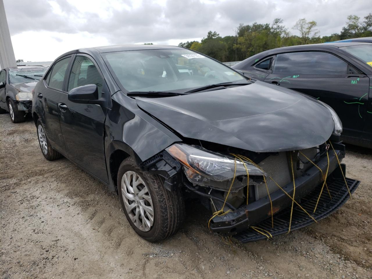 TOYOTA COROLLA L 2017 with VIN 5YFBURHE4HP669178 - Photo from auction