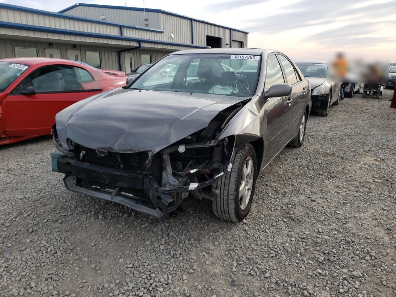 Photo 2 from auction – 2002 TOYOTA CAMRY LE with VIN 4T1BF30K72U509911