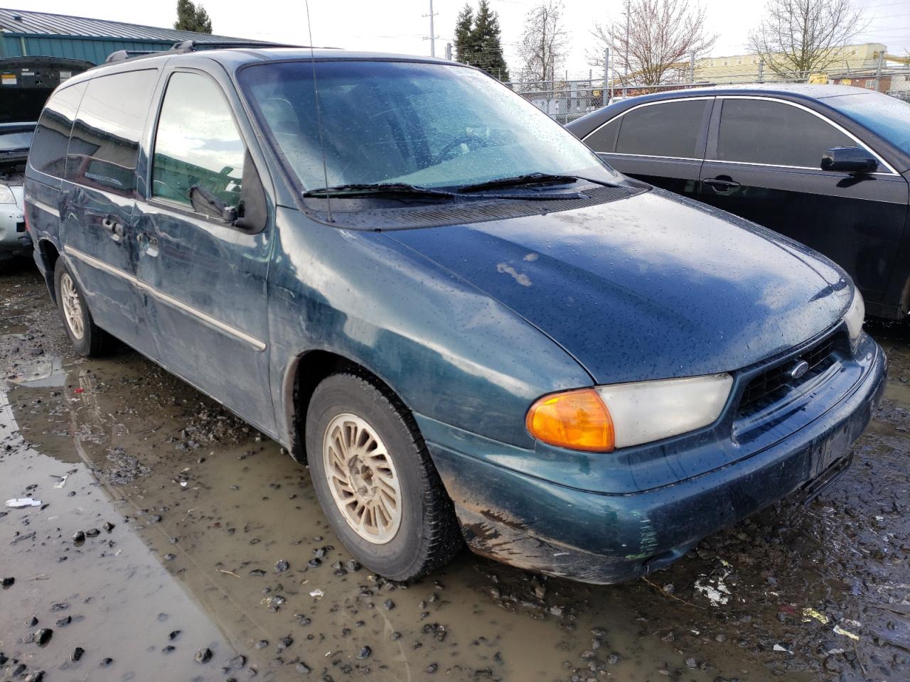 FORD WINDSTAR W 1998 with VIN 2FMZA5146WBC99922 - Photo from auction