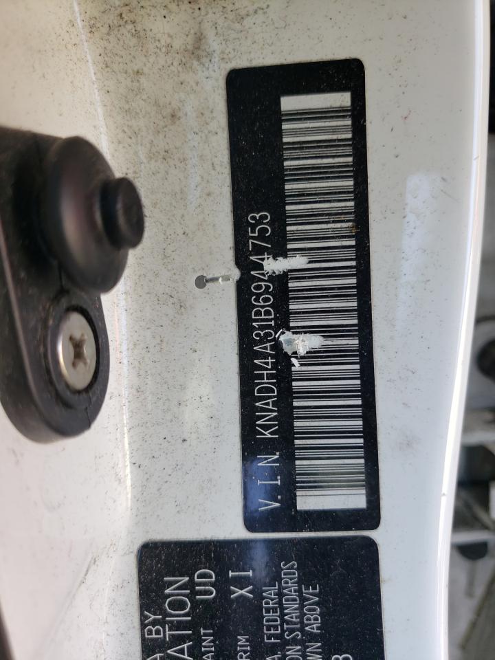 Photo 10 from auction – 2011 KIA RIO BASE with VIN KNADH4A31B6944753