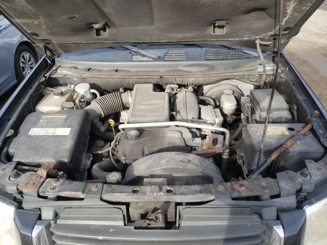 Photo 7 from auction – 2004 GMC ENVOY with VIN 1GKDT13S142434910
